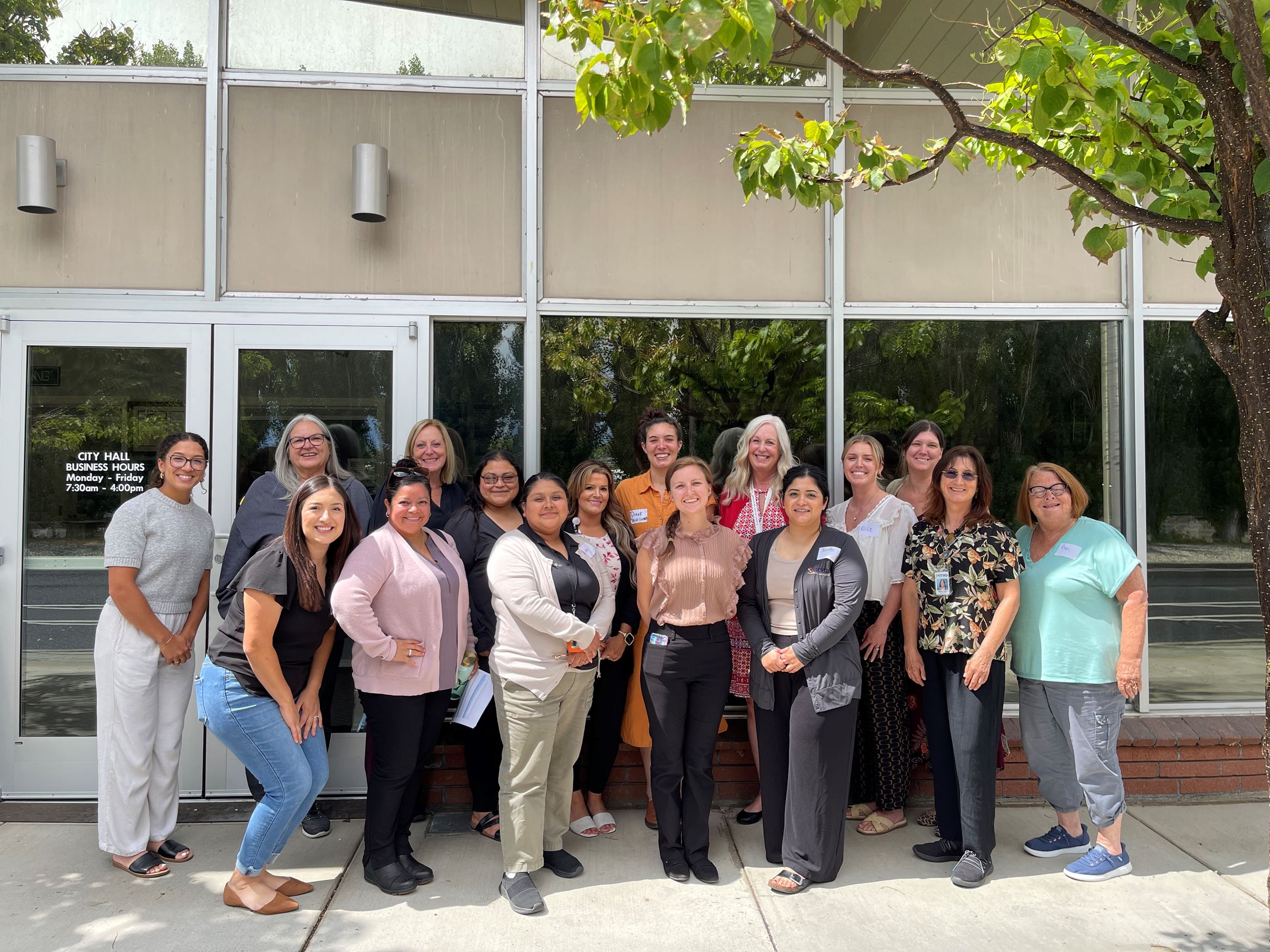 Group of people posing for picture